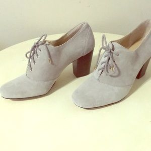Women’s grey suede booties.